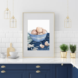 Print of speckled eggs in a blue and white bowl