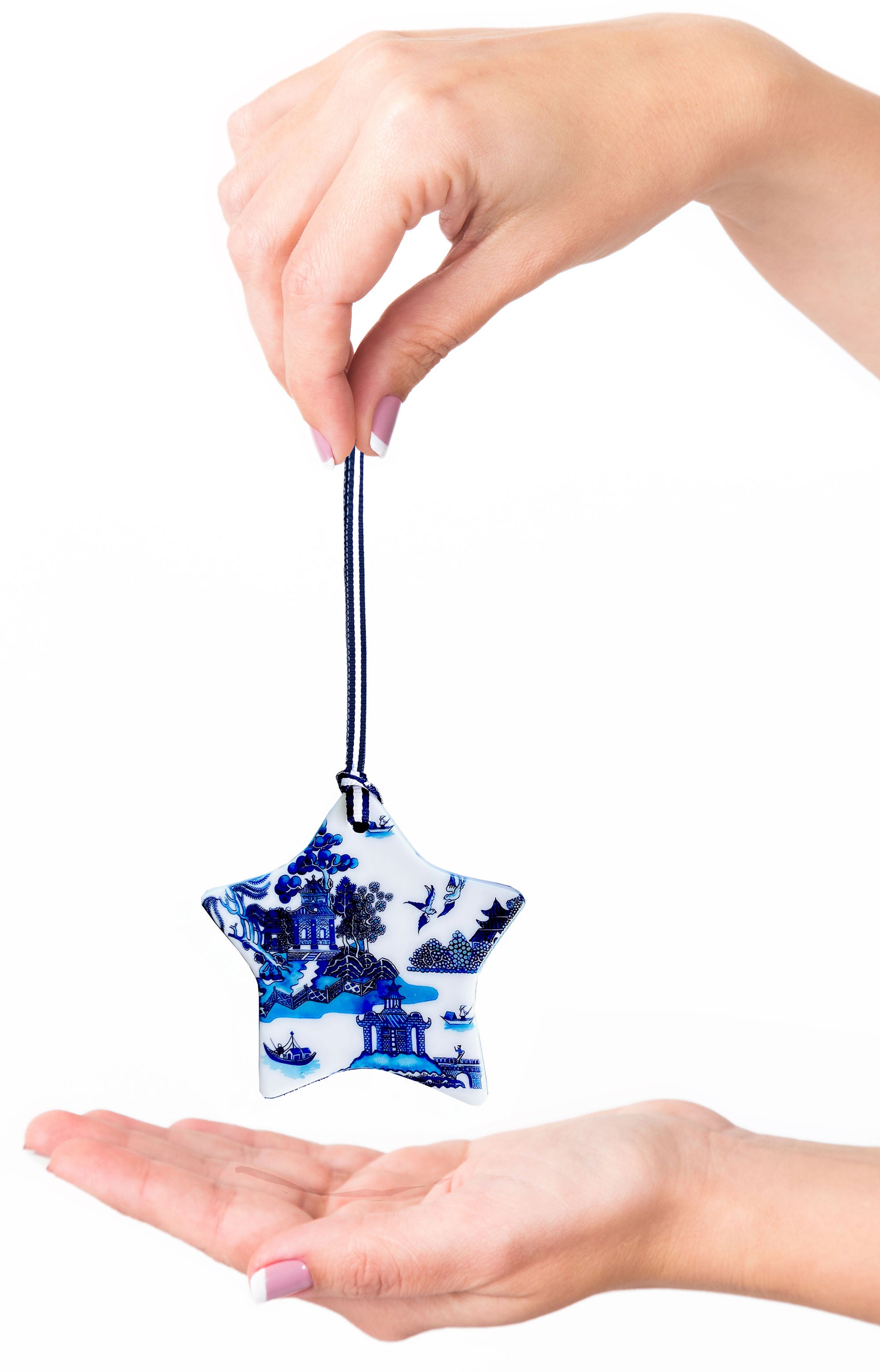 Blue and white ceramic ornament -  Willow star design