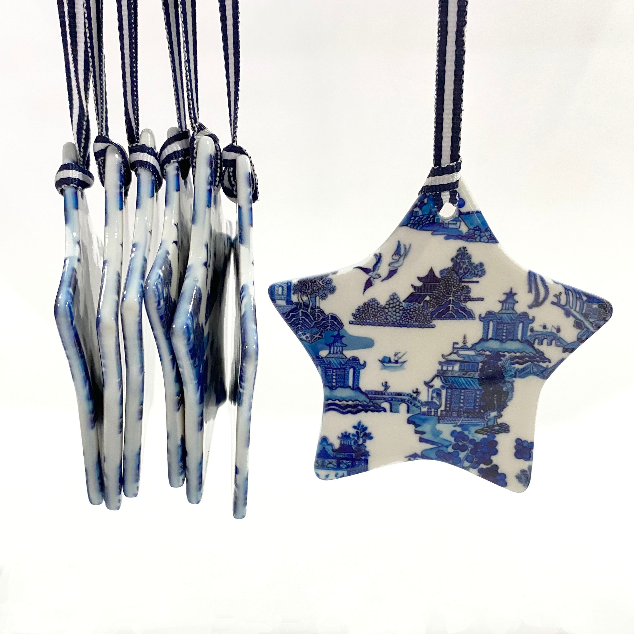 Blue and white ceramic ornament -  Willow star design