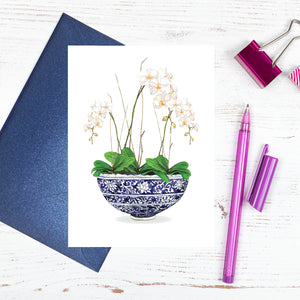 Beautiful orchids in a traditional blue and white chinoiserie bowl card