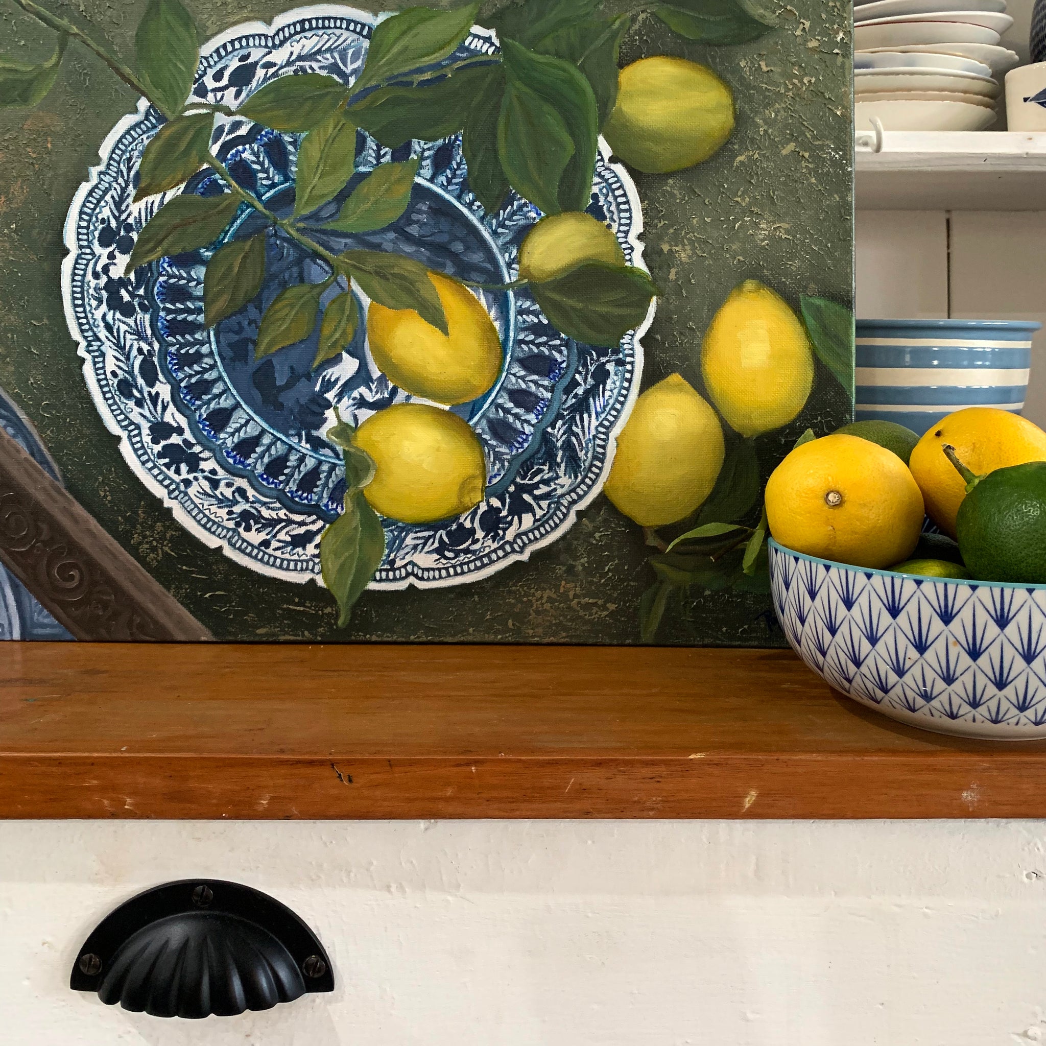 Original Oil painting. Still life of lemons on a blue and white plate.