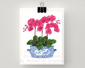 Blue and white chinoiserie planter with pink orchids