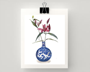 Print of deep pink / red lily in a blue and white dragon vase
