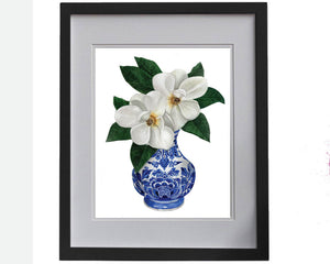 Print of magnolias in a blue and white vase