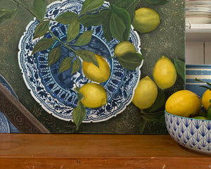 Original Oil painting. Still life of lemons on a blue and white plate.