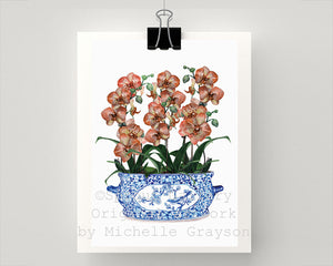 Blue and white chinoiserie planter with peach orchids