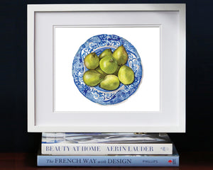 Print of pears on a blue and white plate