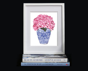 Print of pink peonies in blue and white ming jar.